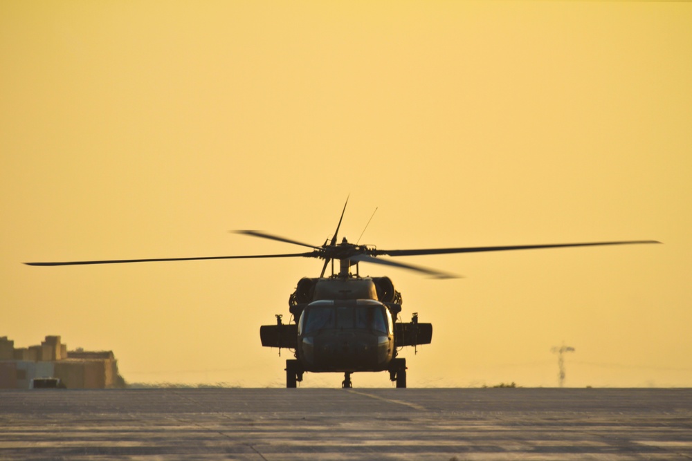 Blackhawk taxis at sunset