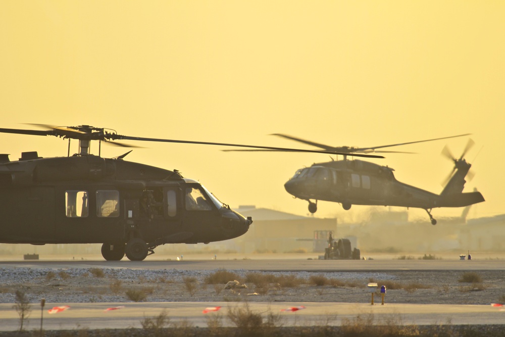 Blackhawks taxi at sunset