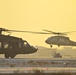 Blackhawks taxi at sunset