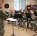 Band brings holiday cheer to Units, veterans