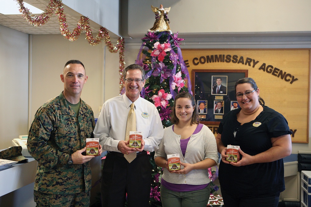 Camp Foster Marine Thrift Shop donates $10,000 to Holiday Food Voucher Program