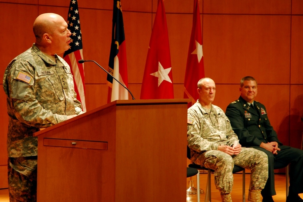 Lt. Gen. Ingram pays his respects to Col. Tom Harris