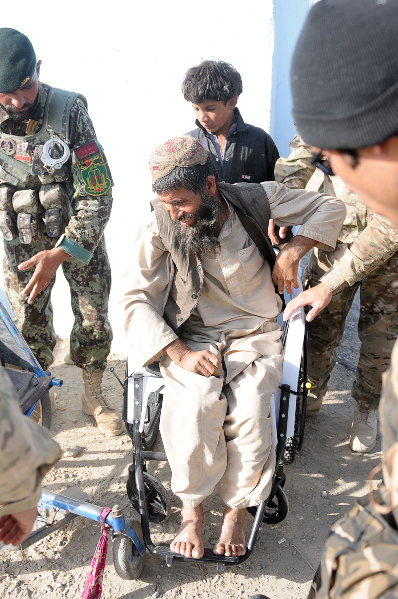 Disabled man receives new wheelchair during Mullah Conference