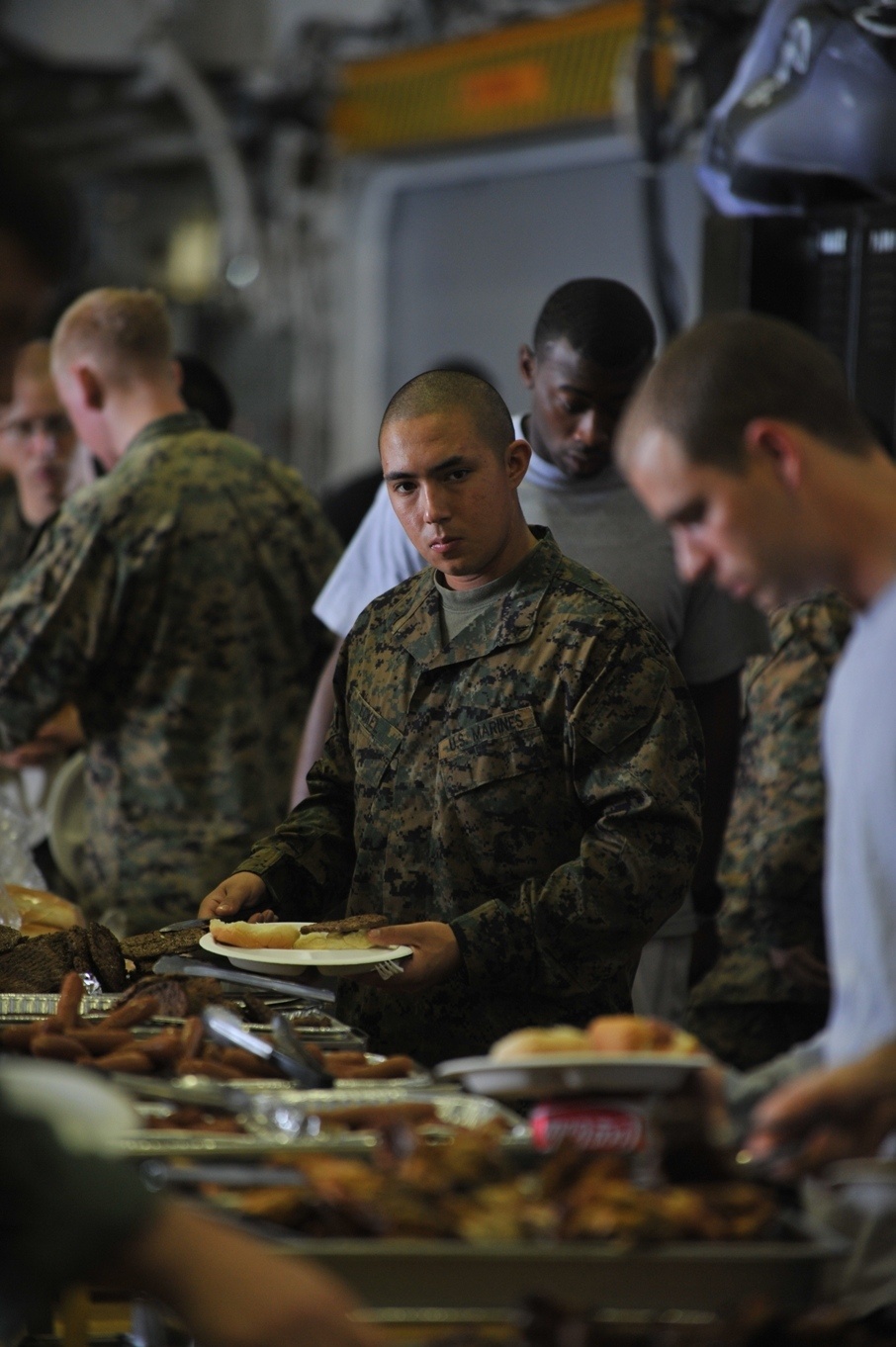 Service members barbecue at sea