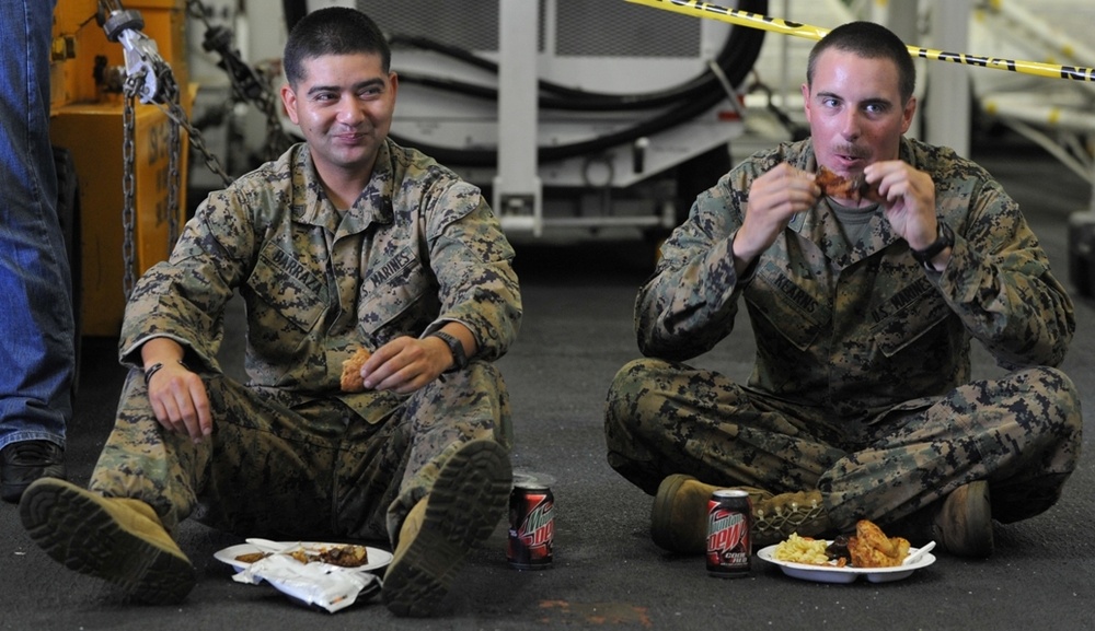 Service members barbecue at sea