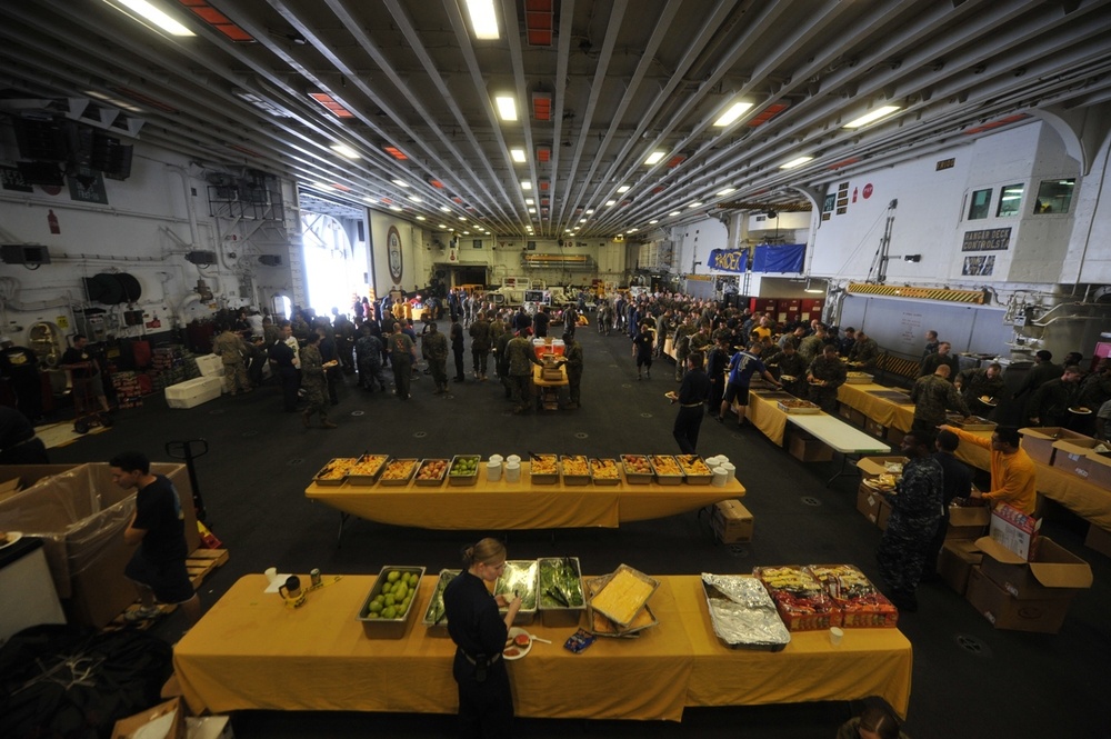 Service members barbecue at sea