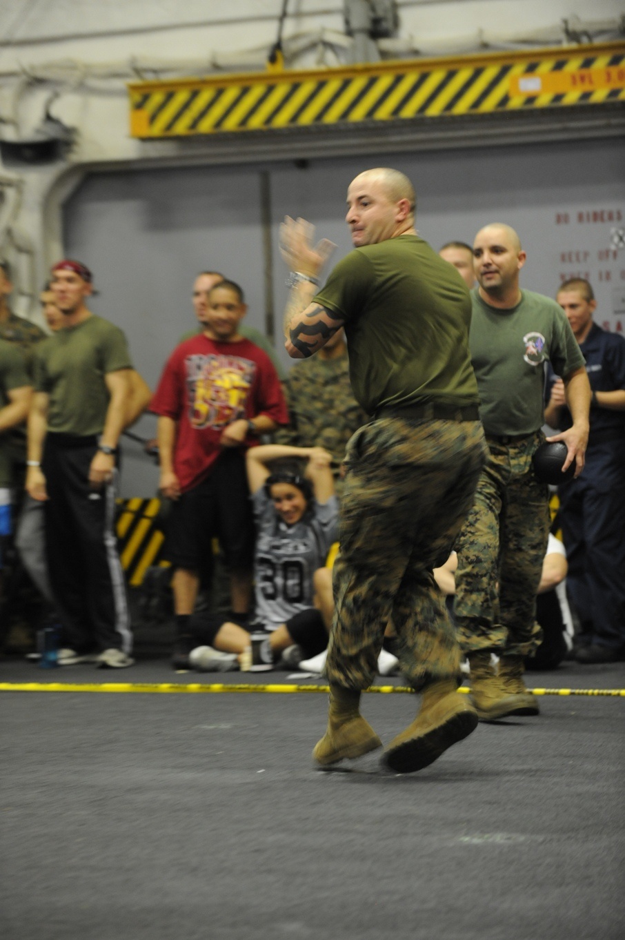 Service members barbecue at sea