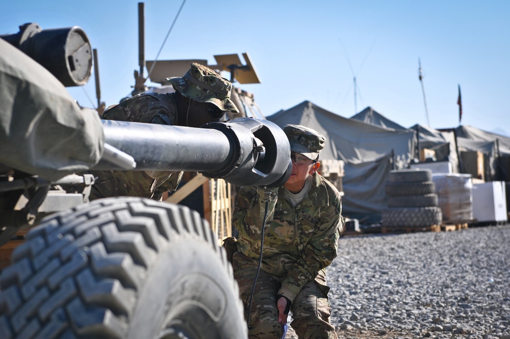 Bravo Company soldiers maintain arms and equipment
