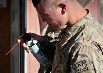 Bravo Company soldiers maintain arms and equipment