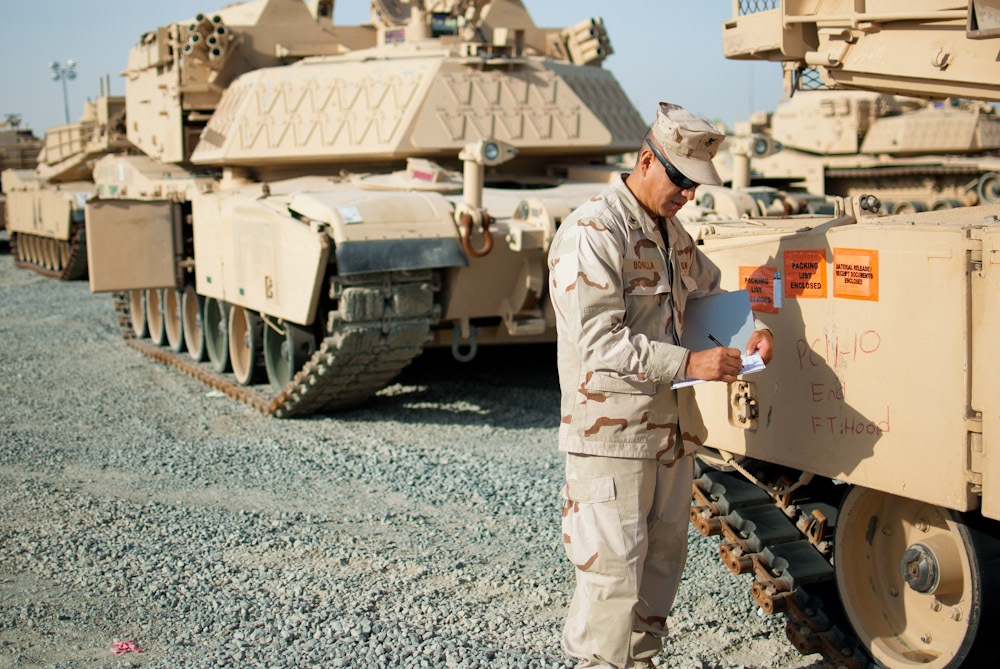 Bonilla inspects vehicle