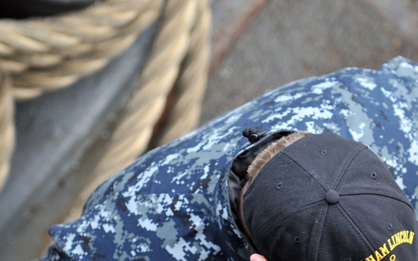 Line handling operations aboard USS Abraham Lincoln
