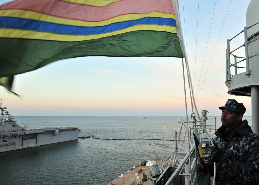 USS Enterprise sailor raises award pennants