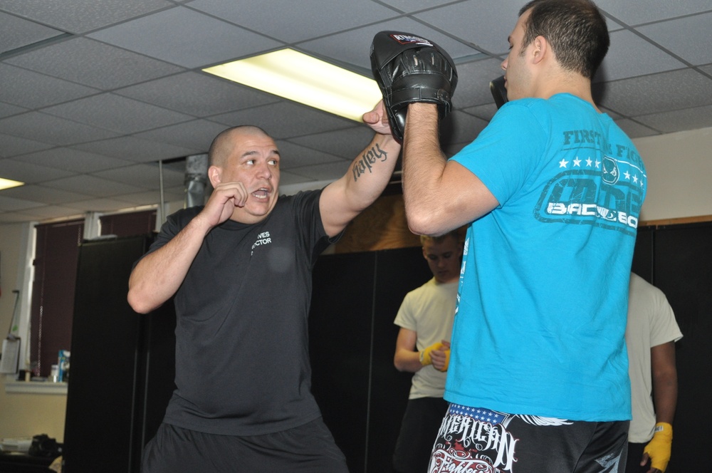 Soldiers engage in combatives training