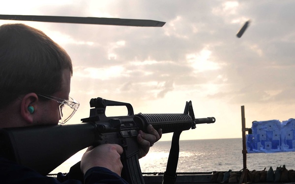 Sailors participate in live-fire qualification aboard USS Mesa Verde