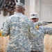 Gen. Lloyd J. Austin, III and Command Sgt. Maj. Joseph R. Allen case USF-I colors