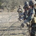 Alpha Company pulling wire