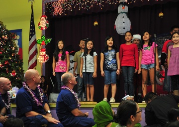 Coast Guard delivers 350 gifts to local elementary school