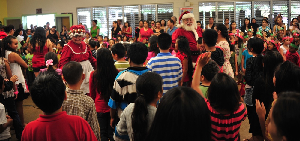 Coast Guard delivers 350 gifts to local elementary school