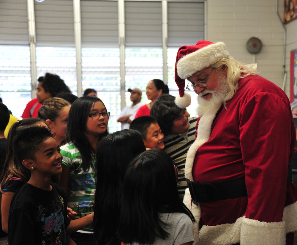 Coast Guard delivers 350 gifts to local elementary school