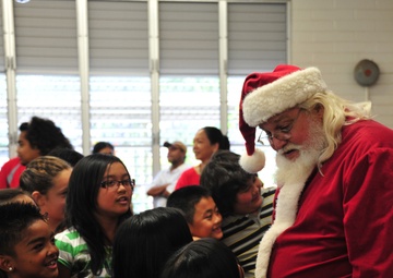 Coast Guard delivers 350 gifts to local elementary school
