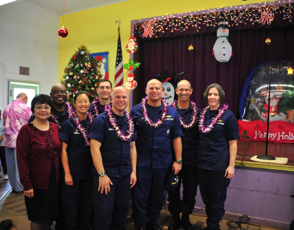 Coast Guard delivers 350 gifts to local elementary school