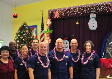 Coast Guard delivers 350 gifts to local elementary school