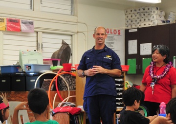 Coast Guard delivers 350 gifts to local elementary school