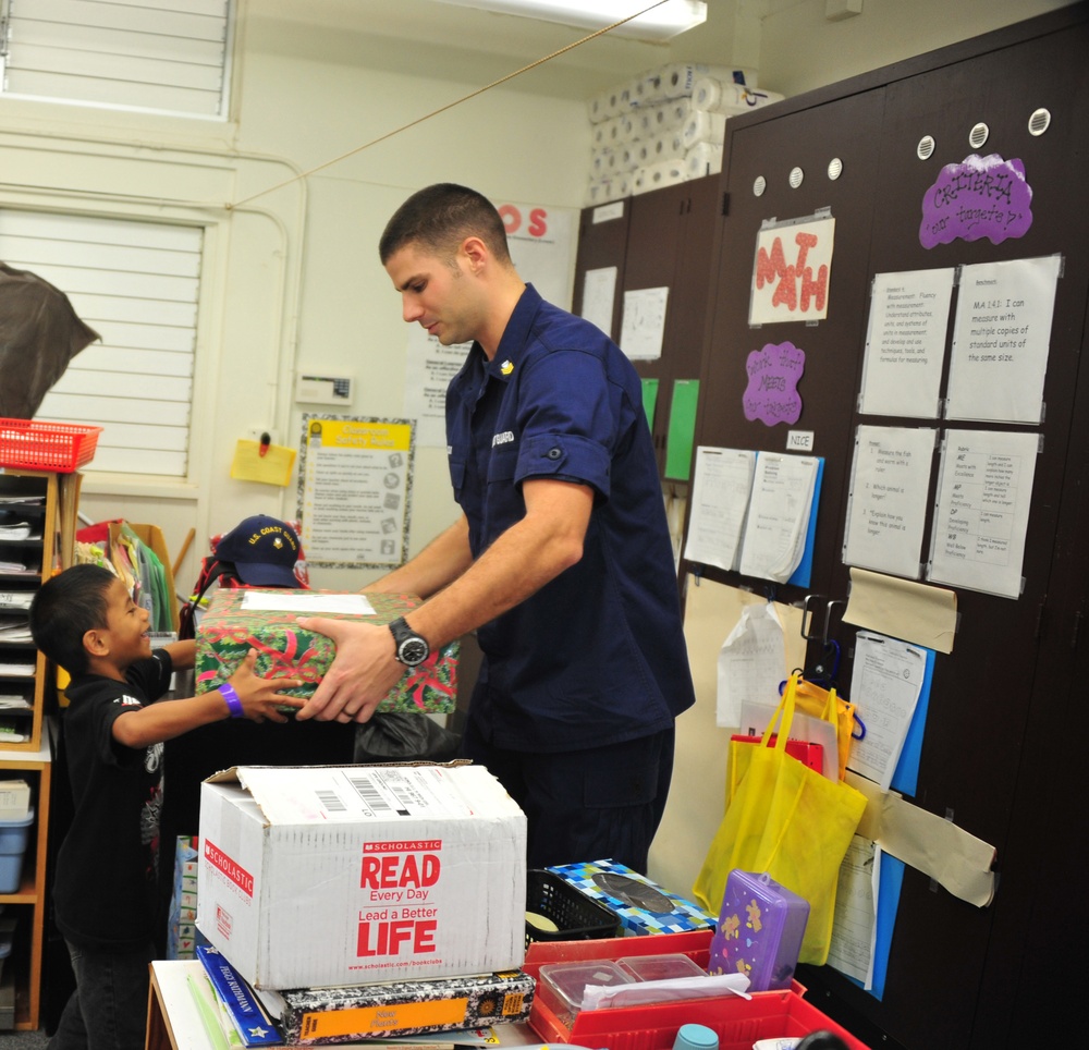 Coast Guard delivers 350 gifts to local elementary school