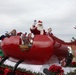 Santa Claus is coming to town: Marines, Santa march down street in Morehead City Christmas Parade