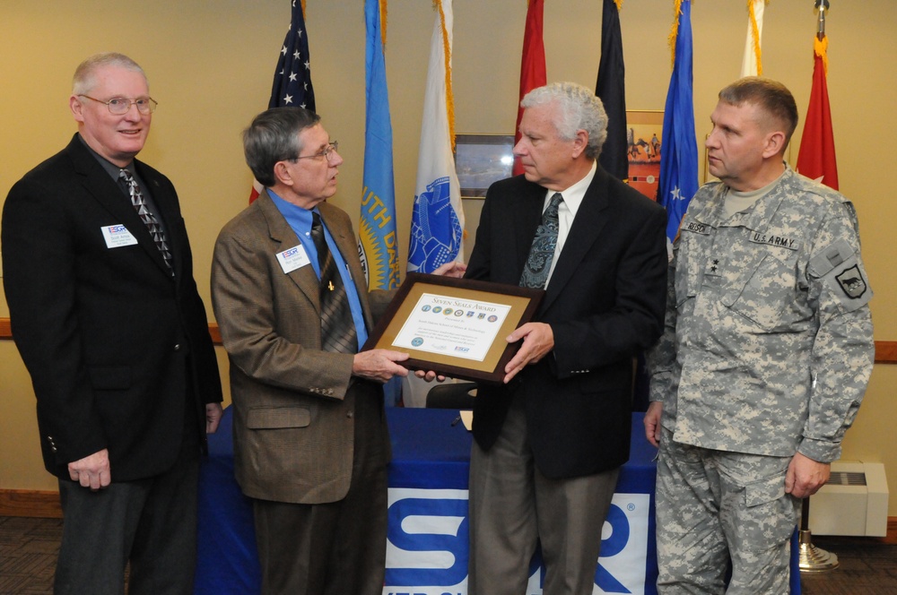The SD Employer Support of the Guard and Reserve present the South Dakota School of Mines and Technology with the ESGR Seven Seals Award