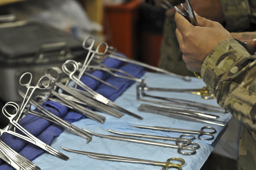 Soldier helps surgeons operate at Forward Operating Base Shank