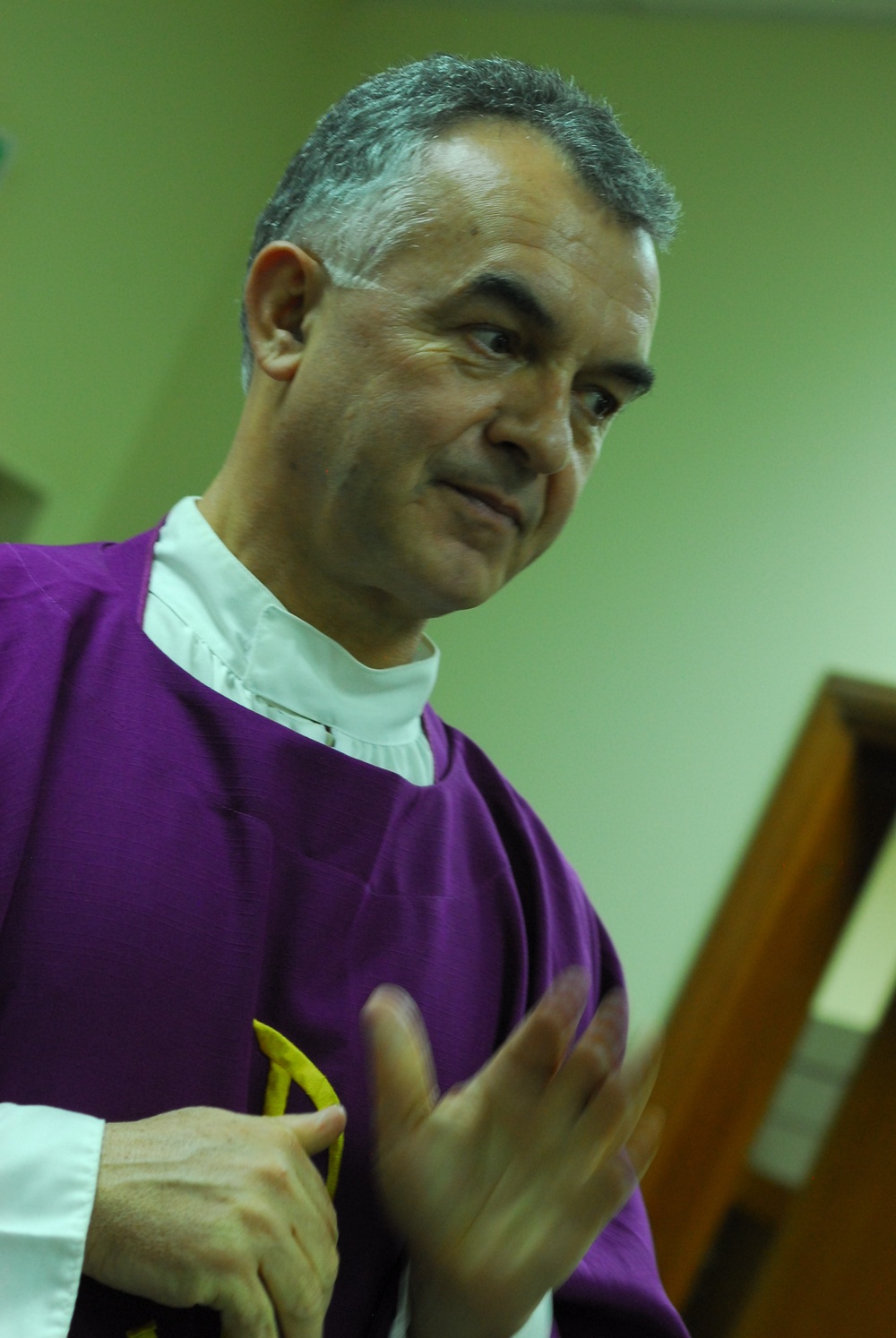 Serving the masses: priest no stranger to transitions