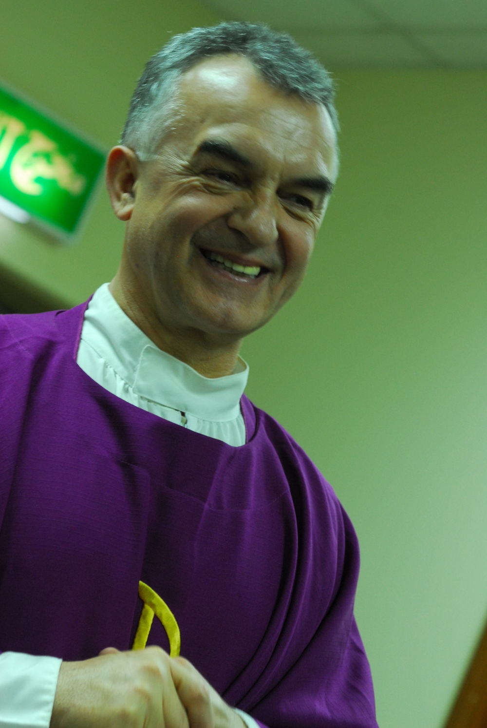 Serving the masses: priest no stranger to transitions