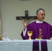 Serving the masses: priest no stranger to transitions