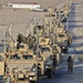 Troops cross the border from Iraq to Kuwait