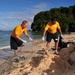 USS Frank Cable sailors clean up beach