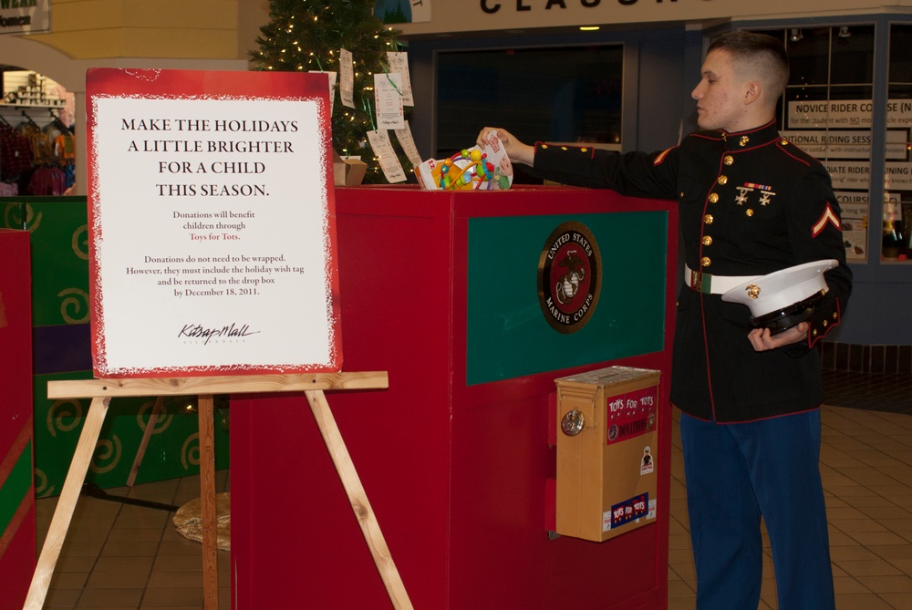 Marine drops in toy for Toys for Tots