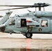 Naval air crewman waves to her family