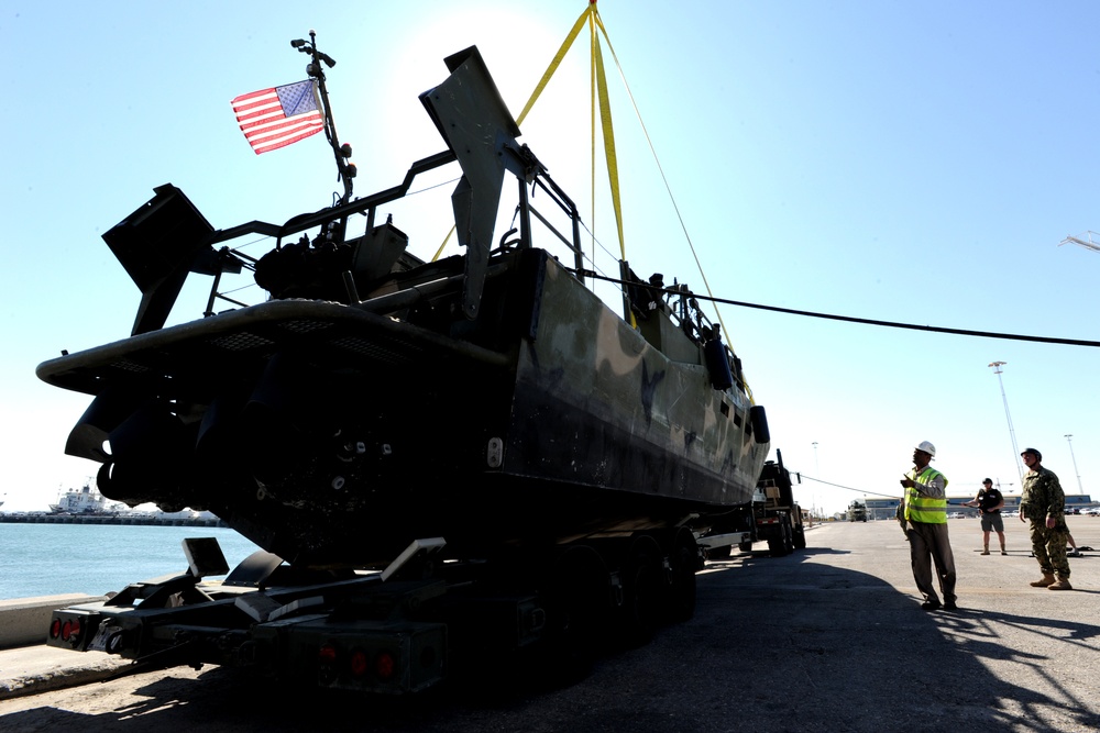 Riverine Squadron Two detachment from Little Creek, Va., launches two Riverine Command Boats after a move to Bahrain.