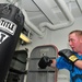 USS Carl Vinson sailor boxes in gym