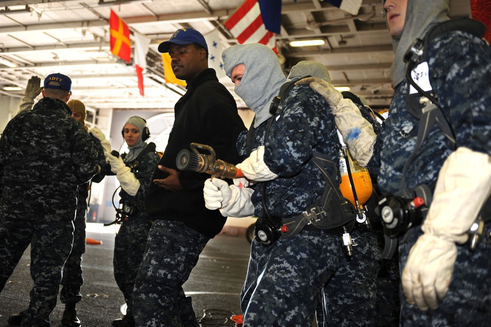 Fire hose training aboard USS Dwight D. Eisenhower