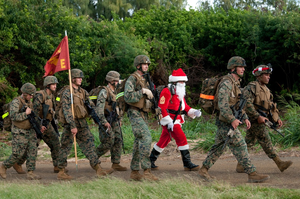 Island Warriors hike with toys, compete in combat competition