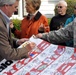 Colonial Cup flag signed for troops overseas