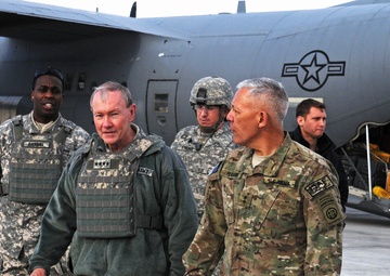 Maj. Gen. Jim Huggins greets Gen. Dempsey on Kandahar Airfield