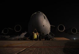 Under Santa's watch: C-17 delivers fuel to remote bases in Afghanistan