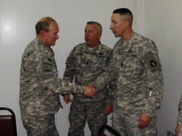 Gen. Dempsey coins 1st Sgt. Dale B. Klitzke