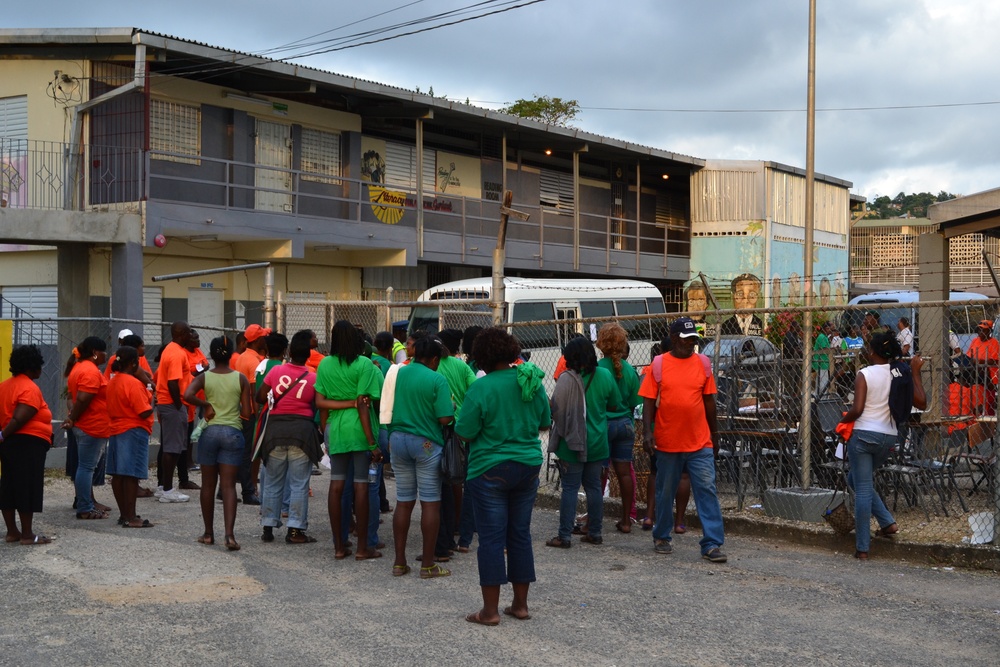 Party supporters watch ballots prepare for tranport