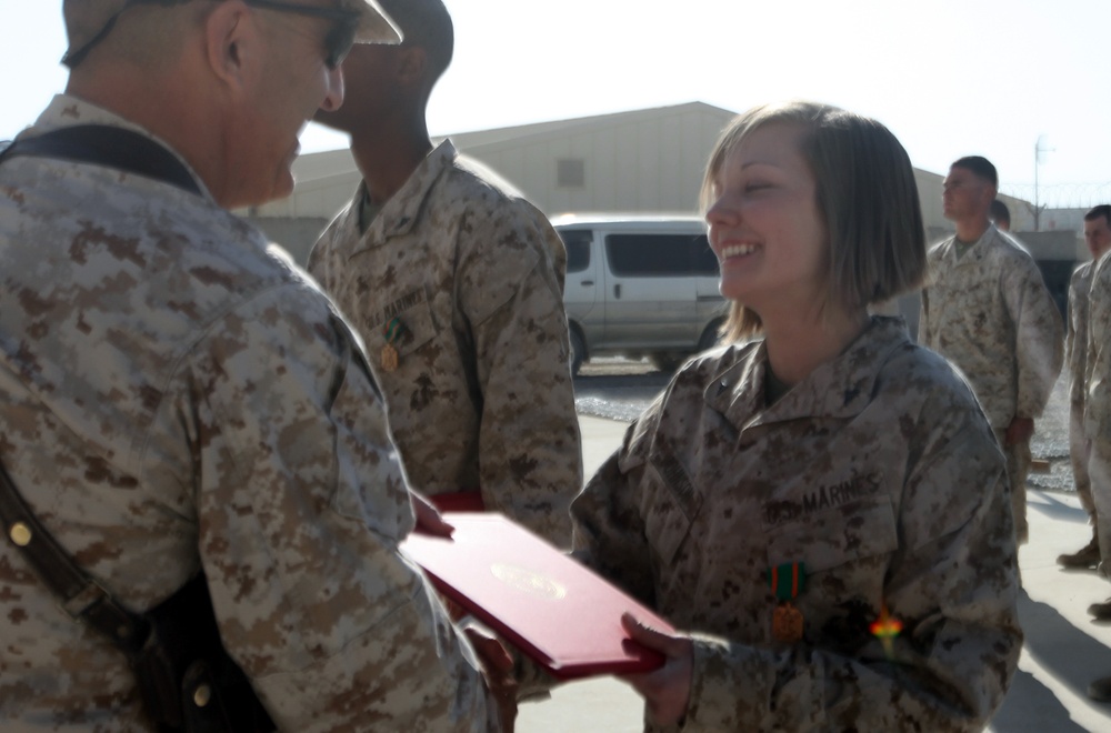 Postal Marines awarded for holiday season work ethic