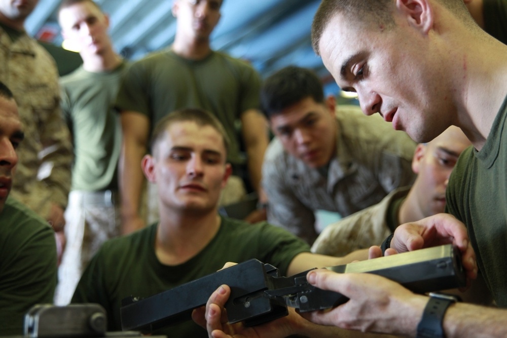 11th MEU Marines conduct weapons handling classes aboard USS Makin Island