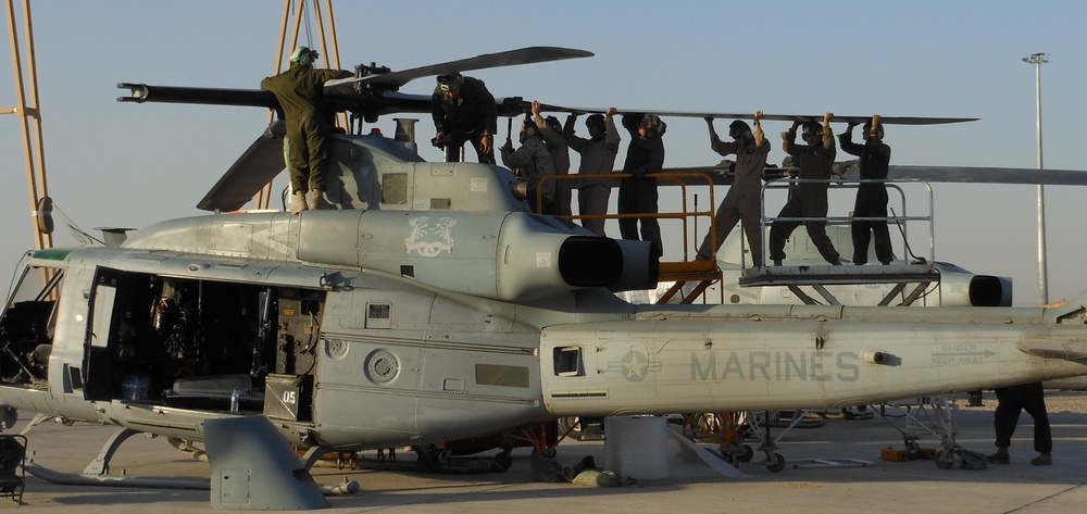 Teamwork fits new blade on Huey in Afghanistan